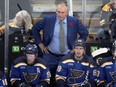 Former St. Louis Blues coach Craig Berube watches players during a game.