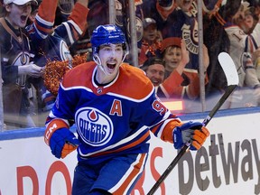 Edmonton Oilers forward Ryan Nugent-Hopkins (93) celebrates a goal against the Vancouver Canucks at Rogers Place in Edmonton on May 18, 2024.