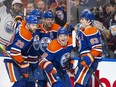 Edmonton Oilers Leon Draisaitl (29), Evan Bouchard (2), Connor McDavid (97), Zach Hyman (18) and Ryan Nugent-Hopkins (93) celebrate Hyman's goal against the Los Angeles Kings in Game 2 of their 2024 Stanley Cup Playoff series at Rogers Place on April 24, 2024, in Edmonton.