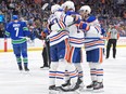 Mattias Ekholm of the Edmonton Oilers celebrates with teammates after scoring a goal against the Vancouver Canucks during the second period in Game Two of the Second Round of the 2024 Stanley Cup Playoffs at Rogers Arena on May 10, 2024 in Vancouver, British Columbia.