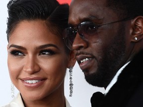 Singer and model Cassie Ventura and rap mogul Sean Combs arrive for the Clive Davis party on the eve of the 60th Annual Grammy Awards on Jan. 28, 2018, in New York.
