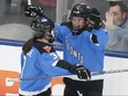 Toronto’s Emma Maltais (right) celebrates with Jocelyne Larocque after scoring against Minnesota in their best-of-five PHWL semifinal playoff game at Coca-Cola Coliseum last night.