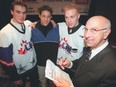 NHL Central Scouting Director Frank Bonello, right, poses with (from left to right) Rostislav Klesla, Lou Dickenson and Raffi Torres ahead of the CHL Top Prospects Game in Toronto, Jan. 13, 2000.