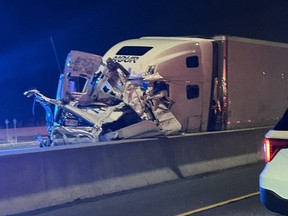 The remains of the front end of a tractor-trailer following a fatal collision on Hwy. 401 in Whitby, Ont., on Monday, April 29, 2024, that left four people dead and at least another person clinging to life.