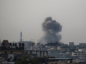 Smoke billows during Israeli bombardment in eastern Rafah in the southern Gaza Strip on May 19, 2024.