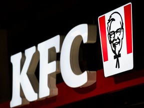 Sign of KFC fast food restaurant at night.
