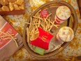 McDonalds McNuggets, fries, and two Grandma McFlurries on tray.
