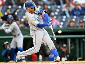Blue Jays batter Justin Turner drives in a run with a single in the first inning against the Nationals at Nationals Park in Washington, D.C., Saturday, May 4, 2024.