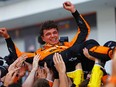 Race winner Lando Norris of Great Britain and McLaren celebrates with his team in parc ferme after the F1 Grand Prix of Miami at Miami International Autodrome on May 5, 2024 in Miami, Fla.