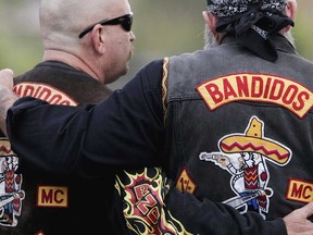 Members of the Bandidos wait in front of the court in Muenster, western Germany, on June 10, 2008.