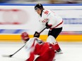 Connor Bedard controls the puck during the preliminary round match between Denmark and Canada at the Ice Hockey World Championships in Prague, Czechia, Sunday, May 12, 2024.