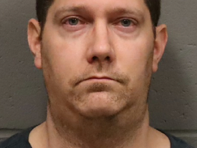 Cameron Ivens, 42, of Milton, faces dozens of charges in relation to a child pornography investigation and police believe there may be more victims.