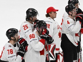 Canada's players react after their semifinal loss to Switzerland at the world championship in Prague on May 25, 2024.