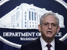 Attorney General Merrick Garland speaks during a news conference at the Justice Department in Washington, Friday, April 14, 2023.