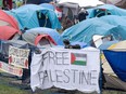 Pro-Palestinian activists at their encampment on the McGill University campus in Montreal, Wednesday, May 1, 2024.