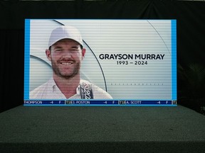 A golf broadcast by CBS is played on an empty stage at the media centre showing a photo of Grayson Murray during the third round of the Charles Schwab Challenge golf tournament at Colonial Country Club in Fort Worth, Texas, Saturday, May 25, 2024.