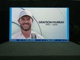 A golf broadcast by CBS is played on an empty stage at the media centre showing a photo of Grayson Murray during the third round of the Charles Schwab Challenge golf tournament at Colonial Country Club in Fort Worth, Texas, Saturday, May 25, 2024.