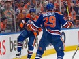 Evander Kane (91) and Leon Draisaitl (29) of the Edmonton Oilers, celebrate a first period goal against the Los Angeles Kings at Rogers Place in Edmonton on May 1, 2024.
