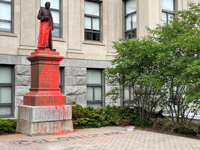 Defaced statue of J. H. Tabaret at uOttawa Sunday, May 26 Photo by Peter Hum, Postmedia