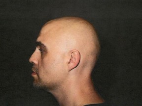 Jeremy Skibicki is shown in this undated handout photo, taken by police while in custody, provided by the Court of King's Bench. Skibicki is charged with first-degree murder for the 2022 killings of Rebecca Contois, Morgan Harris, Marcedes Myran and an unidentified woman Indigenous leaders have named Mashkode Bizhiki'ikwe, or Buffalo Woman.