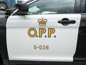 An Ontario Provincial Police cruiser is shown in Vaughan, Ont., on June 20, 2019. A 56-year-old has been airlifted to hospital with serious injuries after live ammunition exploded in a fire in Haldimand County.