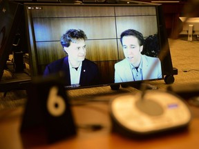 A defamation lawsuit filed by the mother of Marc and Craig Kielburger against the Canadaland podcast and its host will head to trial after an Ontario court rejected an application to have it thrown out, finding the claim has "substantial merit." Marc Kielburger, screen left, and Craig Kielburger, screen right, appear as witnesses via videoconference during a House of Commons finance committee in the Wellington Building in Ottawa, Tuesday, July 28, 2020.