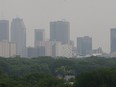 The skyline of Winnipeg, Man. is partially obscured by smoke from Saskatchewan forest fires Thursday July 2, 2015.