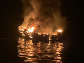 In this photo released by the Santa Barbara County Fire Department on September 2, 2019, a boat burns off the coast of Santa Cruz Island, California.