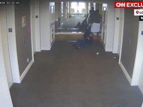 This frame grab taken from hotel security camera video and aired by CNN appears to show Sean "Diddy" Combs attacking singer Cassie in a Los Angeles hotel hallway in March 2016.