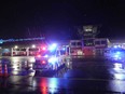 Ambulances are seen at the airport where a London-Singapore flight that encountered severe turbulence was diverted to, in Bangkok, Thailand, Tuesday, May 21, 2024.