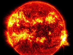 This image provided by NASA's Solar Dynamics Observatory shows a solar flare, the bright flash at right, on Tuesday, May 14, 2024.