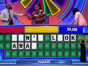 Contestants Luidgi Altidor, Rufus Cumberlander and Cynthia King are pictued on "Wheel of Fortune."