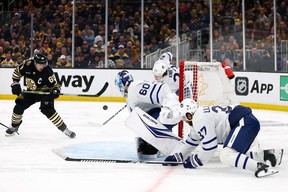 Brad Marchand of the Boston Bruins takes a shot against Joseph Woll of the Maple Leafs during the third period of Game 5 at TD Garden on April 30, 2024 in Boston.