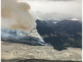 This handout image released by BC Wildfire Service shows smoke columns from the Truax Creek wildfire, Ontario, on May 12, 2024.