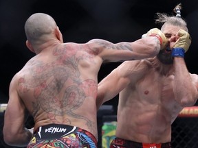 Alex Pereira of Brazil punches Jiri Prochazka of the Czech Republic during a light heavyweight championship bout during UFC 303 at T-Mobile Arena on June 29, 2024 in Las Vegas, Nevada.