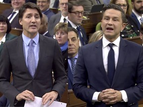 Prime Minister Justin Trudeau, left, and Opposition Leader Pierre Poilievre in the House of Commons on Wednesday, January 31, 2024.