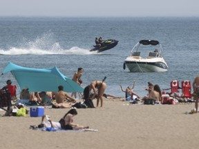People take in the hot weather at Woodbine Beach in Toronto on Friday June 2, 2023. Jack Boland/Toronto Sun
