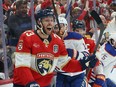 Carter Verhaeghe of the Florida Panthers reacts to scoring a goal during the first period against the Edmonton Oilers in Game 1 of the 2024 Stanley Cup Final at Amerant Bank Arena on June 8, 2024 in Sunrise, Fla.