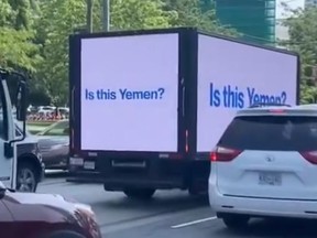Toronto Police say they are investigating messages displayed on this advertising truck.