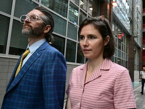Amanda Knox arrives with her husband Christopher Robinson at the courthouse in Florence, on June 5, 2024 before a hearing in a slander case, related to her jailing and later acquittal for the murder of her British roommate in 2007.