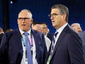 Craig Berube, left, of the Toronto Maple Leafs and Keith Jones of the Philadelphia Flyers chat during the first round of the 2024 Upper Deck NHL Draft at Sphere on June 28, 2024 in Las Vegas, Nevada.