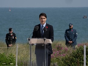 Prime Minister Justin Trudeau speaks at Juno Beach, Thursday, June 6, 2024 in Courselles-sur-Mer., France, during the Canadian National Ceremony commemorating the 80th anniversary of D-Day and the Battle of Normandy.