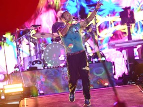 Chris Martin of the band ColdPlay perform on stage during Day 4 of Glastonbury Festival 2024 at Worthy Farm, Pilton, on June 29, 2024 in Glastonbury, England.