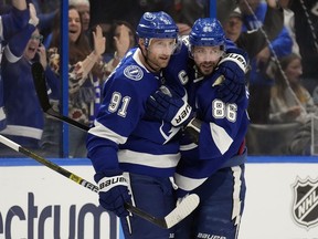Tampa Bay Lightning centre Steven Stamkos (91) celebrates his goal against the Anaheim Ducks with right wing Nikita Kucherov (86) during the second period of an NHL hockey game Saturday, Jan. 13, 2024, in Tampa, Fla.