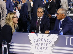 Hayley Wickenheiser, Brendan Shanahan and head coach Craig Berube of the Toronto Maple Leafs talk during the first round of the NHL draft at Sphere on June 28, 2024 in Las Vegas.