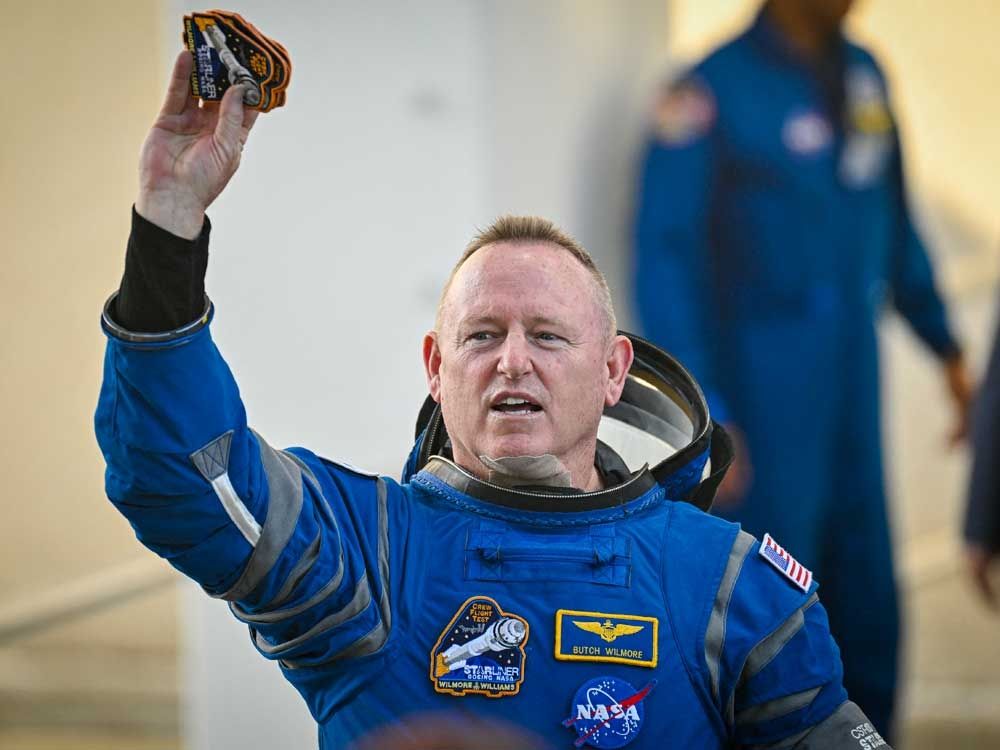 NASA astronauts Butch Wilmore, wearing Boeing spacesuits, departs the Neil A. Armstrong Operations and Checkout Building at Kennedy Space Center for Launch Complex 41 at Cape Canaveral Space Force Station in Florida to board the Boeing CST-100 Starliner spacecraft for the Crew Flight Test launch , on June 5, 2024.
