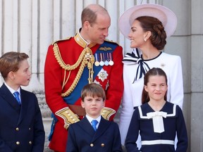 Prince George of Wales, Prince William, Prince of Wales, Prince Louis of Wales, Princess Charlotte of Wales and Catherine, Princess of Wales during Trooping the Colour at Buckingham Palace on June 15, 2024 in London, England.