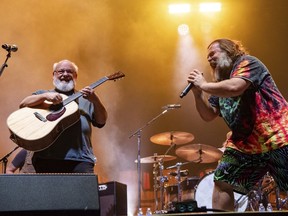FILE - Kyle Gass, left, and Jack Black of Tenacious D perform at the Louder Than Life Music Festival in Louisville, Ky., on Sept. 22, 2022.
