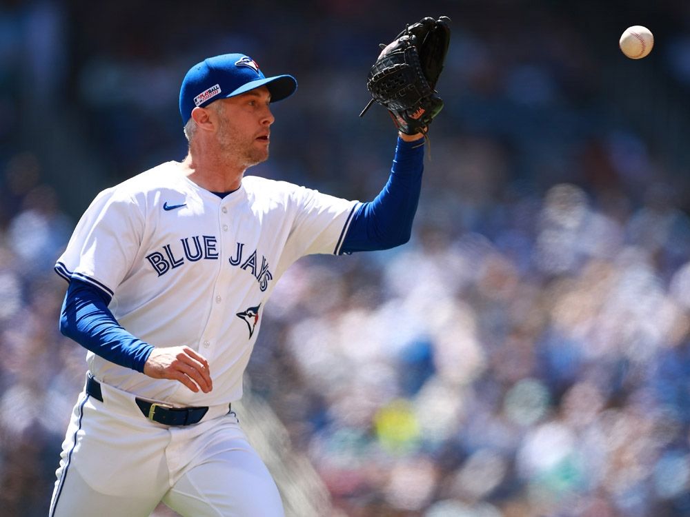 Trevor Richards of the Toronto Blue Jays makes a play at first base during a game at Rogers Centre on June 15, 2024 in Toronto.