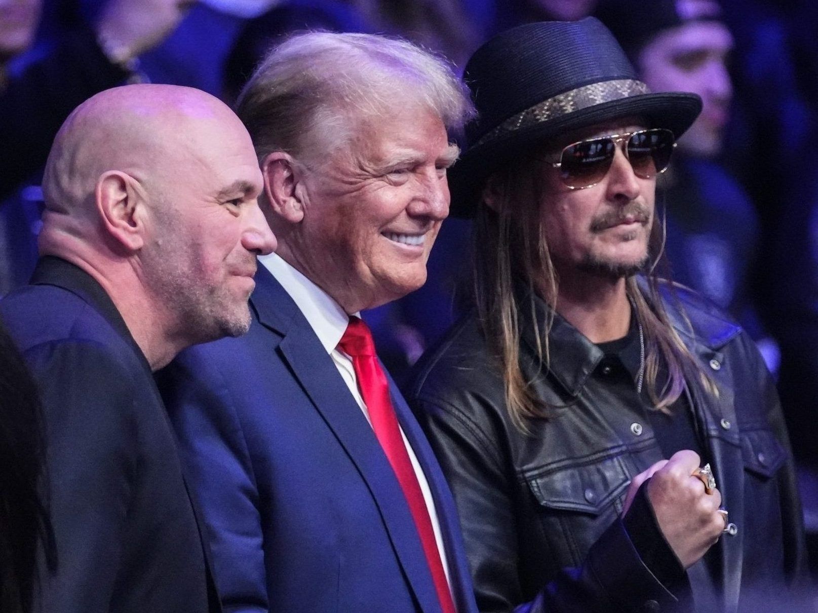 UFC president Dana White, left, and Kid Rock, right, pose for photographs with former President Donald Trump at UFC 295 on Saturday, Nov. 11, 2023, in New York.